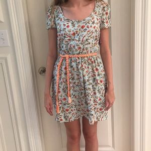 Light blue bird and flower print dress with belt.